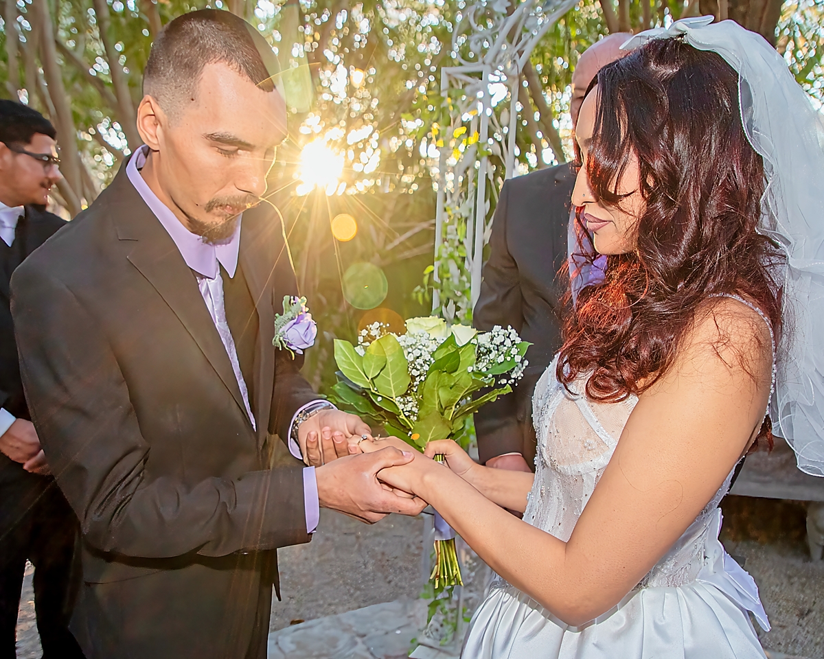 Placing the ring on her finger